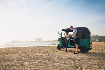 Image showing Traveling by tuk tuk taxi