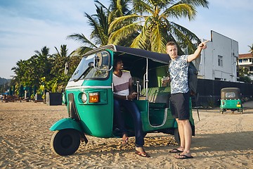 Image showing Traveling by tuk tuk taxi