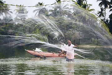 Image showing Fishermen with fishing net