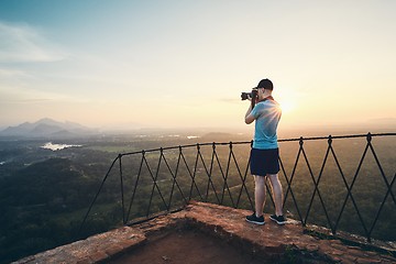 Image showing Photographer on the top of Sigiriya rock