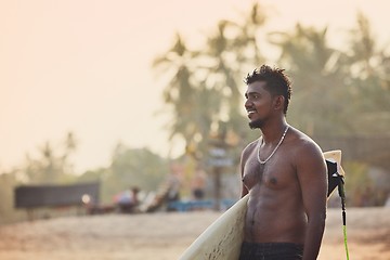 Image showing Portrait of surfer at sunset