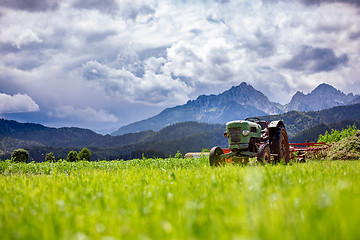 Image showing Old tractor in the Alpine meadows