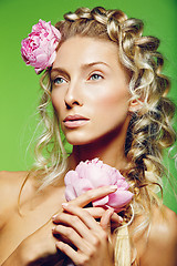 Image showing Beautiful girl with peony flower