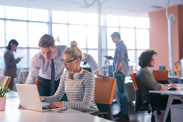 Image showing Two Business People Working With laptop in office