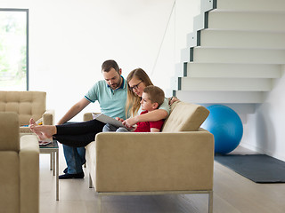 Image showing family with little boy enjoys in the modern living room