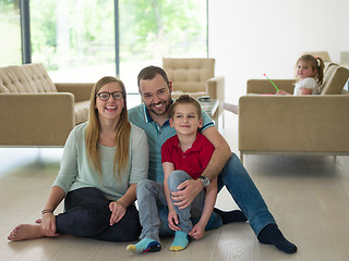 Image showing family with little boy enjoys in the modern living room