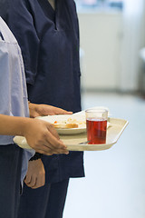 Image showing Nurse Serving Lunch