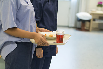 Image showing Nurse Serving Lunch