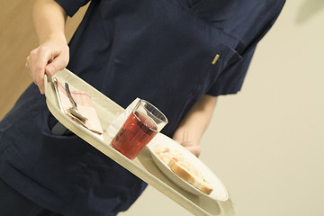 Image showing Nurse Serving Lunch