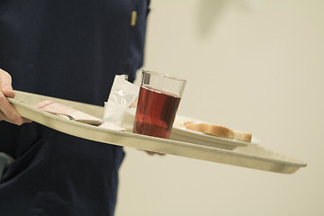 Image showing Nurse Serving Lunch