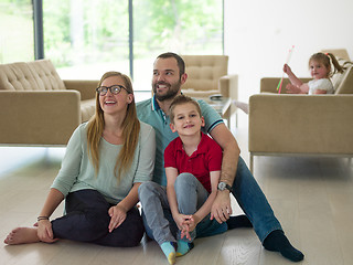 Image showing family with little boy enjoys in the modern living room