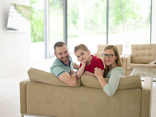 Image showing family with little boy enjoys in the modern living room