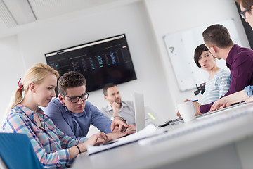 Image showing Two Business People Working With laptop in office