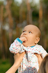 Image showing Baby Boy or Girl Have Fun Outdoors