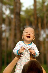 Image showing Baby Boy or Girl Have Fun Outdoors