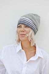 Image showing Beautiful young woman in warm grey beanie.