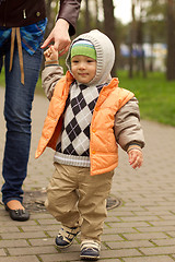 Image showing Baby Learning to Walk in Park