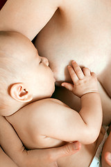 Image showing Mother Breast Feeding Baby