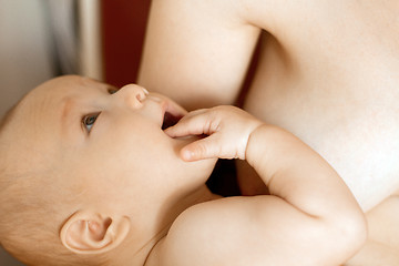 Image showing Mother Breast Feeding Baby