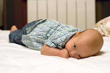 Image showing Baby Boy or Girl lying Down in the Bed