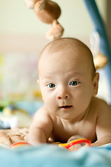 Image showing Baby Boy or Girl lying Down in the Bed