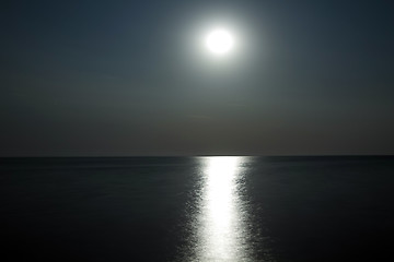 Image showing Moon above the water with moonlight