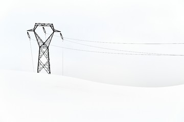 Image showing Electric power lines in snow