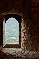 Image showing Passage of an old castle, open door