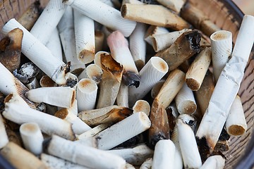 Image showing Cigarette buts in an ashtray