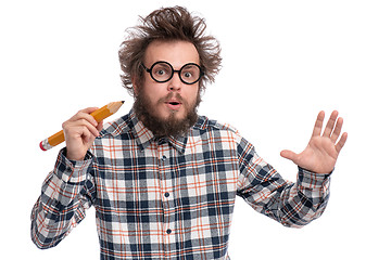 Image showing Crazy bearded man with big pencil