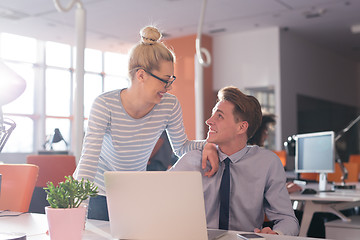 Image showing Two Business People Working With laptop in office