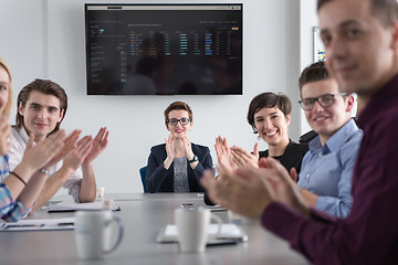 Image showing Group of young people meeting in startup office