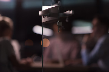 Image showing Multiethnic startup business team in night office