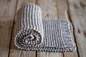 Image showing Hand knitted beige scarf