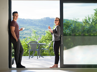 Image showing couple on the door of their luxury home villa