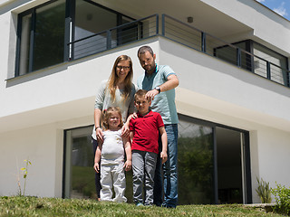 Image showing happy family with children in the yard