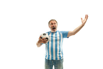 Image showing The Argentinean soccer fan celebrating on white background