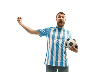 Image showing The Argentinean soccer fan celebrating on white background