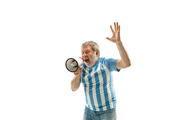 Image showing The Argentinean soccer fan celebrating on white background