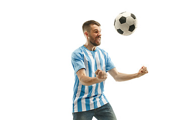 Image showing The Argentinean soccer fan celebrating on white background