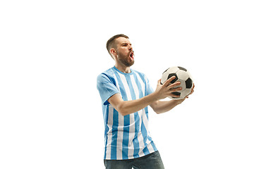 Image showing The Argentinean soccer fan celebrating on white background