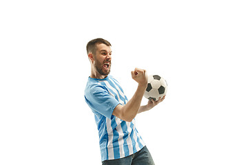 Image showing The Argentinean soccer fan celebrating on white background