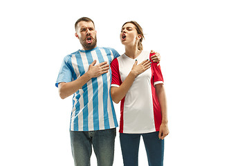 Image showing The soccer fans celebrating on white background