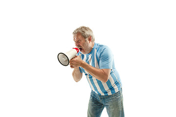 Image showing The Argentinean soccer fan celebrating on white background