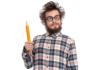 Image showing Crazy bearded man with big pencil