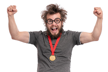 Image showing Crazy bearded man with medal