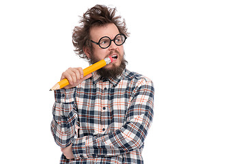 Image showing Crazy bearded man with big pencil