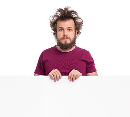 Image showing Crazy man with blank signboard