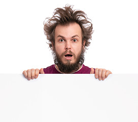 Image showing Crazy man with blank signboard