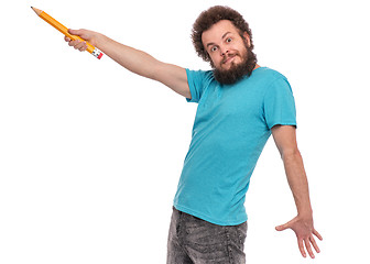 Image showing Crazy bearded man with big pencil